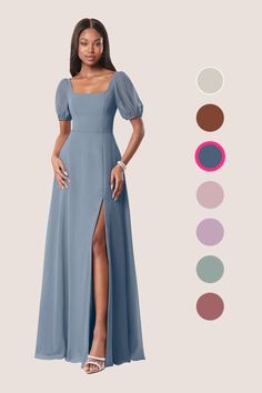 a woman in a long blue dress standing next to an assortment of color swatches