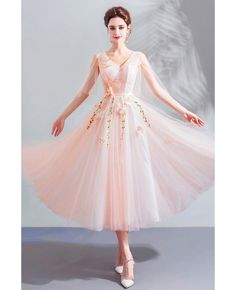 Buy Beautiful Fairy Pink Tulle Tea Length Party Dress V-neck at wholesale price online. Free shipping and pro custom service since 2009. Tea Length Fairy Dress, Pink Tulle V-neck Evening Dress, Fitted Pink V-neck Dress For Wedding, Pink V-neck Dress For Banquet, Summer V-neck Evening Dress For Banquets, Summer V-neck Banquet Evening Dress, Summer V-neck Evening Dress For Banquet, Spring Tulle Evening Dress For Banquet, Spring Wedding V-neck Mini Dress