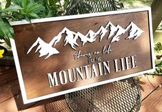 there is a sign that says it's the mountain life