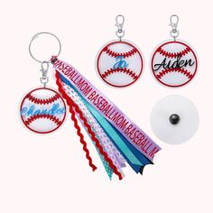 three different key chains with baseballs and name tags attached to them, one for each team