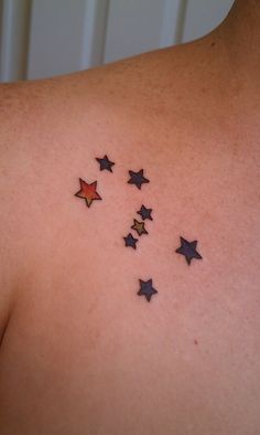 a woman's chest with stars on it