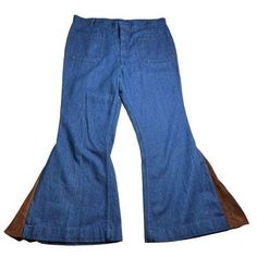 One of a kind modified vintage 1970s sailor Seafarer Utility Trousers Jeans in bright blue lightweight denim (possibly chambray-style, not thick/stiff) that have been modified into bellbottoms with a brown velvety "suede"-feel v-panel. Super high-waisted with zip and hook closure; front and back pockets. Standout OOAK/bespoke statement piece to add to the grooviest of retro hippie festival closets.  Seafarer 65% Cotton | 35% Polyester Estimated size M/L (No tag and have been modified - please review measurements in photos)  *SHORT INSEAM  Approximate flat-lay measurements:  Waist: 17.5" Rise: 13.5" Inseam: 26" Leg-Opening: 14"  Minor signs of wear; no major flaws.  Vintage items are preloved and may display signs of wear as consistent with age and use. Please refer to images as most accura Retro Blue Jeans With Pockets, Retro Denim Blue Bottoms With Pockets, Fitted 70s Inspired Cotton Flare Jeans, 70s Inspired Fitted Flare Cotton Jeans, Vintage Dark Wash Pants For Fall, Retro Medium Wash Pants For Fall, Medium Wash Retro Pants For Fall, Vintage Cotton Flare Jeans For Fall, Vintage Medium Wash Flare Jeans For Fall