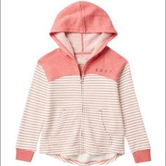 Color: Mineral Red Sim Details S=8, M=10, L=12, Xl=14, Xxl=16 - Attached Hood - Long Sleeves - Front Zip Closure - Solid And Striped French Terry Construction - Front And Back Text Print Details - Split Kangaroo Pockets - High/Low Hems - Rib Knit Trim - Imported Fiber Content 60% Cotton, 40% Polyester Care Machine Wash Cozy Red Cotton Tops, Cozy Red Cotton Top, Cute Red Winter Sweatshirt, Cute Red Sweatshirt For Winter, White Hoodie Top, Cozy Red Hooded Top, Roxy Girls, Solid And Striped, Girls 16