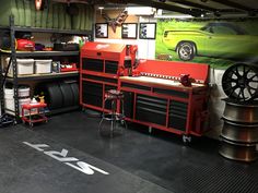 a garage with lots of tools and equipment in it