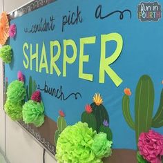 a bulletin board with paper flowers and cactuses on it that says, wouldn't pick a sharper