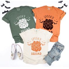 These super-soft, garment-dyed Spooky Squad Shirts feature a cute ghost design and are perfect for group Halloween shirts! They're printed on Comfort Colors® tees for that vintage, lived-in feel and look--easy to style oversized or wear as a relaxed fit tee. Unisex sizing for men and women. Please check the size charts for the perfect fit! Details: ✔ Ethically grown cotton: 100% ringspun US cotton for ultimate comfort. ✔ Medium weight: fabric for a perfect balance of durability and softness. ✔ P Spooky Cotton Shirt With Screen Print, Spooky Cotton Shirt With Funny Print, Spooky Cotton Shirt With Character Print, Spooky Cotton Top With Funny Print, Spooky Cotton Tops With Funny Print, Spooky Cotton Tops With Character Print, Spooky Cotton Top For Halloween, Spooky Cotton Halloween Top, Spooky Cotton Shirt For Halloween