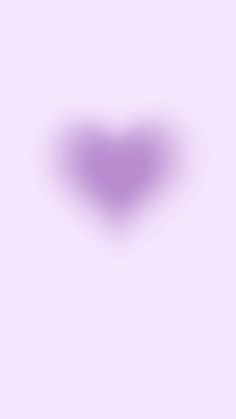 a purple heart shaped object on a pink background with the light reflecting off it's left side