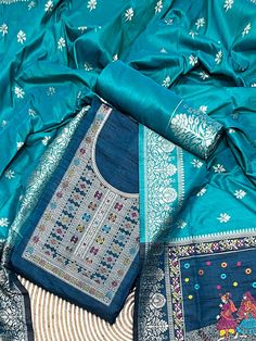 Product Details Teal Blue Unstitched Salwar Suit in kalamkari Raw Silk Elevated with Kalamkari Thread Woven Work Accompanied by an Unstitched Kurta, Bottom and Dupatta with Tassels Comes with the Vishnu Weaves Promise of Premium Quality Size & Fit Kurta & Bottom : 5.20 Mtrs Dupatta : 2.40 Mtrs Material & Care Dry Wash Only Blue Semi-stitched Kalamkari Print Sets, Blue Unstitched Salwar Kameez With Kalamkari Print, Blue Kalamkari Print Dupatta For Eid, Unstitched Blue Salwar Kameez With Kalamkari Print, Blue Dupatta With Kalamkari Print For Eid, Blue Sets With Kalamkari Print And Traditional Drape, Blue Kalamkari Print Anarkali Set For Eid, Designer Blue Set With Kalamkari Print, Blue Kalamkari Salwar Kameez For Diwali