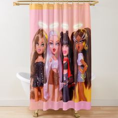 three barbie dolls shower curtain hanging in front of a bathtub