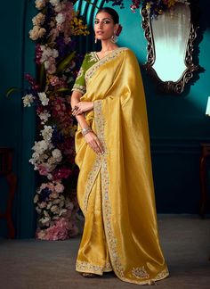 Golden Yellow Multi Embroidered Traditional Silk Saree Designer Gold Embroidered Pre-draped Saree, Designer Embroidered Gold Pre-draped Saree, Gold Embroidered Art Silk Pre-draped Saree, Gold Art Silk Pre-draped Saree With Resham Embroidery, Gold Anarkali Pre-draped Saree With Embroidery, Gold Anarkali Pre-draped Embroidered Saree, Semi-stitched Paithani Silk Saree For Wedding, Gold Pre-draped Saree With Resham Embroidery For Navratri, Festival Banarasi Silk Pre-draped Saree With Dori Work