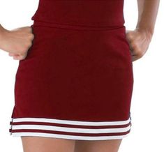 This is such a stylish maroon & white a-line cheer skirt, and you will absolutely love the way it pairs with our fitted tops, bandeaus, bodysuits and sweatshirts. It is made of a high quality moisture wicking 100% polyester fabric and will give you that great fitted style you want on game day. The triple white stripe detail is adorable! Smooth elastic waistband