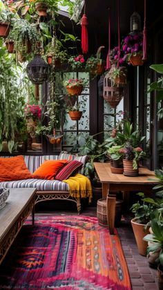 a living room filled with lots of potted plants