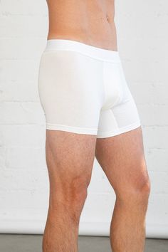 Mens boxer brief with tonal Magnlens elastic band. White Stretch Multi-pack Boxer Briefs, Compression Multi-pack Boxer Briefs, Fitted Solid Color Boxer Briefs With Short Leg, Solid Color Fitted Boxer Briefs With Short Leg, Fitted Solid Color Short Leg Boxer Briefs, Compression Boxer Briefs With Short Legs, Solid Color Seamless Short Leg Boxer Briefs, Fitted Multi-pack Boxer Briefs, Fitted White Boxer Briefs With Short Leg