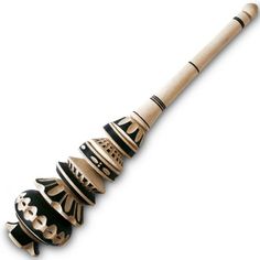 a wooden baseball bat with black and white designs on it