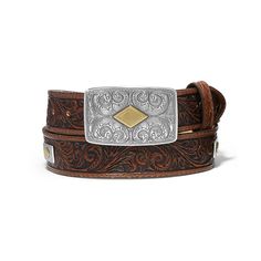 The handsome tooled detailing on this fine leather Western belt is echoed in the etchings on its buckle and hardware accents. Expert artisan stitching on the perimeter ensures it’s not only good looking – it’s made to last. Classic Concho Belt For Western-themed Events, Leather Concho Belt Buckles For Rodeo, Classic Leather Belt Buckles For Rodeo, Hand Tooled Leather Belt Buckles For Ranch, Hand Tooled Leather Belt Buckles For Rodeo, Hand Tooled Leather Belts For Western-themed Events, Leather Concho Belts For Western-themed Events, Classic Antique Belt Buckles For Ranch, Rustic Leather Belt Buckles For Rodeo