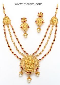 22 Karat Gold 'Lakshmi' Necklace & Drop Earrings Set with Uncut Diamonds,Ruby & South Sea Pearls
   - 235-DS422 - in 56.450 Grams for USD $5436.03. 
Made in India by Totaram Jewelers Online this product is in Gold - 22 Karat BIS Hallmark 916 KDM Gold  & is an excellent gift for Adult - Women. Ships fully insured with secured guaranteed delivery for free with your order over $250 from New Jersey USA & comes with 30 days exchange policy. 22k Gold Jewelry Sets For Puja And Festivals, 22k Gold Jewelry Sets For Festivals, 22k Gold Jewelry Set With Latkans For Festivals, Uncut Diamond Necklace, 22k Gold Necklace, Diamond Necklace Set, Gold Necklace Set, Uncut Diamond, South Sea Pearls