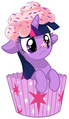 a pinkie pony sitting on top of a cupcake