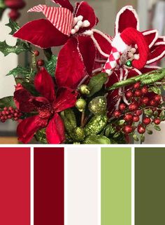 a red and green color scheme with poinsettis, greenery and candy canes