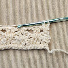 the crochet stitch is being worked on