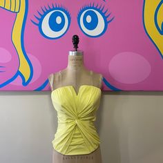 Summer Dressing Shines Wearing This Pale Yellow Silk Bustier By Bebe. Wear Along Or Under A Blazer With Pencil Pants Or Pencil Skirt. Size S Across Chest - 17 1/2 In. Across Waist - 13 In. Back To Bottom - 10 1/2 In. Material: 100% Silk Made In China Note: The Area At Zipper Top Closing Has Come Unstitched And Needs Repair. Fitted Strapless Tube Top For Spring, Fitted Tube Top With Built-in Bra For Date Night, Stretch Tube Top For Summer Evenings, Fitted Flirty Tube Top With Built-in Bra, Fitted Sleeveless Tube Top For Evening, Stretch Tube Top With Sweetheart Neckline For Summer, Fitted Sleeveless Tube Top For Night Out, Fitted Tube Top For Spring Party, Fitted Tube Top For Summer Night Out