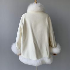 Clothing Length: RegularMaterial: WoolMaterial: PolyesterMaterial: CashmereMaterial: AcrylicSeason: WinterStyle: CasualCollar: MANDARIN COLLARClosure Type: Covered ButtonSleeve Style: Batwing SleeveSleeve Length(cm): FullType: CloakOuterwear Type: Wool & BlendsGender: WOMENDecoration: FurDecoration: PocketsDecoration: SashesMaterial Composition: Wool blendPattern Type: SolidSeason: Spring, Winter, AutumnGender: Female, Women, Girls, LadiesMaterial: 51%-70% wool White Linen Bedding, Wool Coat Women, Batwing Sleeve, Fur Collars, Bat Wings, Mandarin Collar, Winter Wardrobe, Wool Coat, Winter Coat