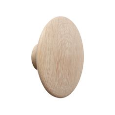 an oval wooden knob on a white background