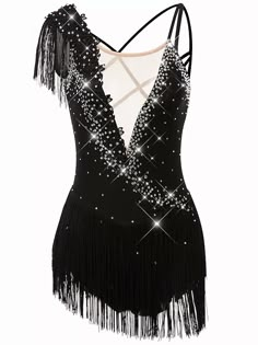 a black and white dress with fringes on it