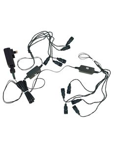 several electronic cords connected to each other on a white background