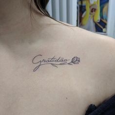 a woman with a tattoo on her shoulder saying grateful and an arrow in the middle