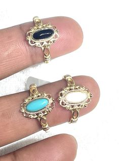 Metal is sterling silver. Gold color is covered in 14k gold vermeil. Turquoise, mother of pearl, black onyx are all genuine gemstones. Cute, sweet and dainty ring for everyday, any day wear Gold Turquoise Ring In Sterling Silver, Gold Turquoise Open Ring As A Gift, Classic Oval Enamel Ring For Gift, Elegant Handmade Midi Promise Rings, Elegant Turquoise Cabochon Ring, Gold Sterling Silver Turquoise Promise Ring, Gold Oval Turquoise Ring Gift, Oval Gold Turquoise Ring Gift, Heirloom Style Gold Turquoise Ring As Gift