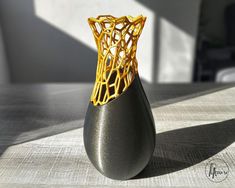 a vase that has some kind of thing in it