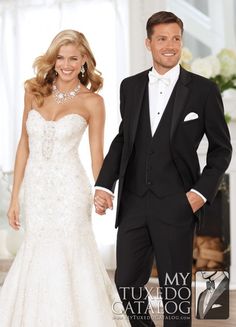 a man in a tuxedo standing next to a woman in a wedding dress