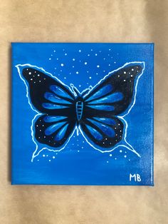 a painting of a blue butterfly with stars on it