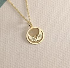 14K Real Solid Gold angel wing gold necklace ● Material of pendant: Solid Gold 14k ( REAL GOLD ) ● Metal Stamp: 14L ( REAL GOLD ) ● The pendant is available in 6 sizes: - 14,0 mm / 0,55 inches ( Diameter ) In the photos - 15,3 mm / 0.60 inches ( Diameter ) - 16,5 mm / 0,65 inches ( Diameter ) - 19,1 mm / 0,75 inches ( Diameter ) - 21 mm / 0,82 inches ( Diameter ) - 23 mm / 0.90 inches ( Diameter ) ( In the photos the size is 14mm / 0.55 inches Diameter ) ( Jump Ring inner diameter: 4 mm ) ● Mate Gold Wing-shaped Sterling Silver Necklace, Elegant 14k Gold Wing-shaped Jewelry, Yellow Gold Wing-shaped Necklace For Gift, Elegant Yellow Gold Wing-shaped Necklace, Elegant Wing-shaped Yellow Gold Necklace, Wings Jewelry, Angel Wings Necklace, Angel Wings Jewelry, Wings Pendant