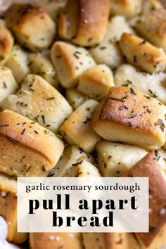 garlic rosemary sourdough pull apart bread in a baking pan with text overlay