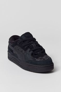 Chunky '90s skate sneaker by Puma with a lace up front and paneled upper. Retro style with a cushioned midsole and finished with textured tread at the rubber outsole.Features. Chunky sneakers from Puma Lace up closure Paneled upper Grippy rubber outsole Content + Care. Textile, leather, rubber Spot clean Imported Chunky Skate Shoes, All Black Fits Men, Chunky Shoes Men, Cool Mens Sneakers, 90s Skate, Urban Shoes, Pretty Shoes Sneakers, Chunky Shoes, Sneakers Puma