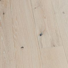 an image of wood flooring that looks like it has been cleaned and is white