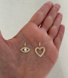 This adorable heart charm looks great alone or layered with necklaces! 14K Gold 15mm Charm only 14K YELLOW GOLD IS IN STOCK AND READY TO SHIP Evil Eye Charm, Heart Charm, Personalized Custom, Evil Eye, Personalized Jewelry, Looks Great, Personal Style, Initials, Im Not Perfect