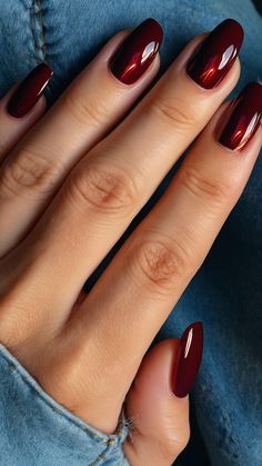 Get inspired by these gorgeous red fall nails for 2024 From dark cherry to chrome wine almond and more find stunning designs for short nails Whether you prefer a daring or chic look these nail designs will have you feeling fabulous Shiny Maroon Nails, Cherry Chrome Nails Almond, Nail Cherry Red, Fall Red Nails 2024, Wine Red Nails Short, Chrome Wine Nails, Chrome Red Nails Short, Deep Red Nails Almond, Wine Nails Short