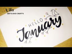 a piece of paper with the words hello january written on it and a bird sitting on top