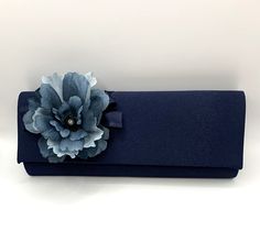 Stunning Bridal Wedding Satin Navy Blue Clutch Bag Perfect wedding accessory.   Elegant addition for those on the day essentials. Measurement  26cm x 10cm x 5cm This bag compliments our navy blue flower embellished wedding shoes and hat Embellished Wedding Shoes, Navy Blue Clutch, Blue Clutch Bag, Wedding Handbag, Navy Blue Flowers, Blue Clutch, Wedding Accessory, Blue Flower, Simply Beautiful