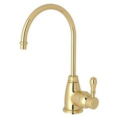 a gold faucet with two handles and nozzles on the side, in front of a white background