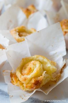 some food that is sitting on top of tissue paper and ready to be eaten or eaten