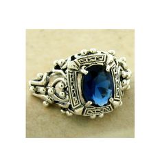 Vintage Estate 1.00 Carat Simulated Sapphire Solitaire Filigree Ring. 925 Solid Sterling Silver. Stamped 925. Excellent Condition/Like New. . Antique Sapphire Ring In Sterling Silver As Gift, Classic Blue Sterling Silver Jewelry, Antique Sterling Silver Sapphire Ring As Gift, Antique Sterling Silver Sapphire Ring Gift, Vintage Blue Filigree Ring For Anniversary, Classic Blue Jewelry With Filigree Details, Blue Engraved Sterling Silver Rings, Engraved Blue Sterling Silver Rings, Classic Blue Topaz Jewelry Stamped 925