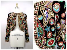 "This beautiful vintage piece embellished with beading and accented with colorful gems and jewels. It's in perfect condition! There are no closures. Measurements are taken with the front brought together. Bust - 38\" Shoulders - 16\" Sleeves - 24\" Total Length - 17\" Tag Size - Medium All of my items come from a smoke-free and pet-free home.  If you have any questions, please don't hesitate to ask!" Beaded Couture, Vintage Inspired Wedding Dresses, Moissanite Ring Set, Shrugs And Boleros, Dress Art, Beaded Jewels, Chic Leather, Star Top, Beaded Top