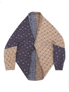 an open jacket with different patterns on the front and back, sitting against a white background