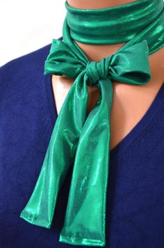 This is a sweet tie that can be used as a bow, a necktie, a scarf, or a hair tie. It is super festive in metallic green, and will add a little flair to a plain shirt. It is made from polyester, with a hint of spandex for wonderful durability. Easy care! Machine wash, line dry. This listing is for the tie only. Party Neckwear With Tie Neck Detail, Green Adjustable Tie For Party, Adjustable Green Ties For Party, Adjustable Green Tie For Party, Green Standard Tie For Parties, Green Standard Tie For Party, Women's Neck Ties, Christmas Necktie, Outdoorsman Gifts