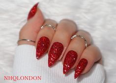 Show stopping, jaw dropping red glitter press on nails!PRODUCT DETAILS▪️ Textured red holographic glitter▪️ Glamorous, sexy and dangerous▪️ Twinkle like crazy when they hit the light▪️ These nails give you life!▪️ Beautiful Christmas Nails!WEARING... Red Glitter Stiletto Nails, Red Textured Nails, Red Glitter Valentine Nails, Sparkling Nails Glitter, Red Acrylic Nails Stiletto, Sparkle Red Nails, Red Sparkle Nails Acrylic, Red Nails Sparkle, Red Glittery Nails