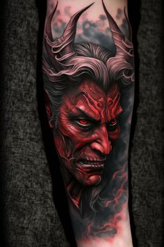 a man's leg with a demon face on it and red flames coming out of his eyes