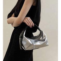 Silver SUDIU Leather Tote Bag | i The Label – I The Label Chic Silver Handheld Shoulder Bag, Elegant Baguette Bag With Large Capacity, Large Capacity Evening Baguette Clutch Bag, Large Capacity Baguette Evening Clutch, Evening Baguette Clutch With Large Capacity, Evening Clutch Baguette Bag With Large Capacity, Leather Hobo Bag For Party, Leather Shoulder Bag With Large Capacity For Party, Leather Hobo Bag With Mobile Phone Pocket For Evening